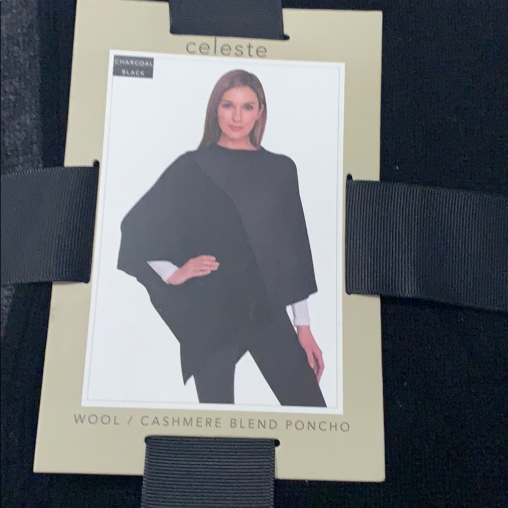 Celeste poncho. Brand new, still in wrapping.